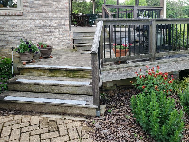 Aluminum non-slip treads on wood steps on back yard deck