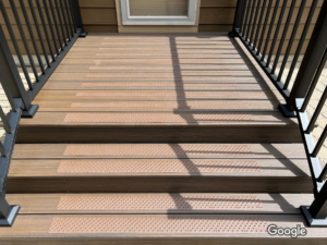 Chestnut Brown non-slip treads on synthetic wood stairs