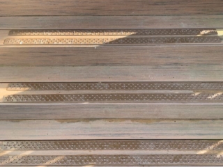 brown-aluminum-double-deck-treads-on-wood-stairs-600px