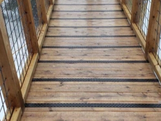 deck-treads-black-wet-wood-ramp-treehouse-handi-treads-600px Black Deck Treads on Natural Wood Ramp