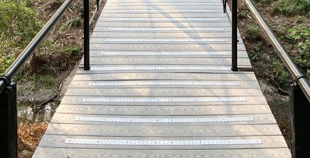 Aluminum Non-slip Deck Treads on treated wood ramp/bridge