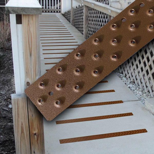 Chestnut Brown ramp treads on concrete ramp by HandiTreads