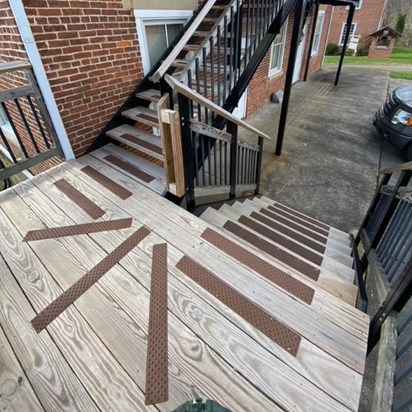 https://handitreads.com/wp-content/uploads/2023/11/non-slip-stair-treads-treated-wood-chestnut-brown-handitreads-600px.jpg